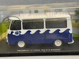 a toy bus with a blue and white design in a display case