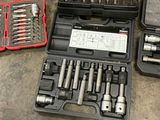 a lot of tools that are laying out on the floor