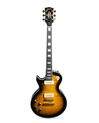 a close up of a guitar on a white background