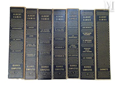 un lot de cinq livres ornés de lettres dorées
