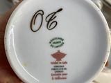 a person holding a plate with a number on it