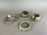 several pieces of metal are sitting on a table