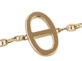 an image of a close up of a gold chain with a letter o on it