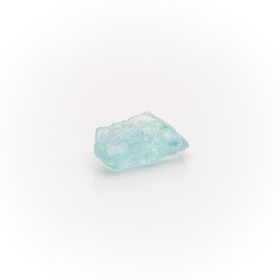 an aquamarine blue diamond on a white background