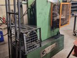 a machine that is sitting inside of a building