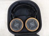 a pair of headphones in a case on a table
