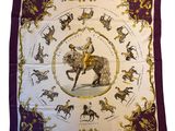 a picture of a square scarf with a picture of a man riding a horse