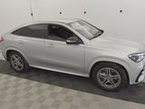 the mercedes gle suv is parked in the garage