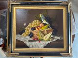 a painting of a bird sitting on a basket of fruit