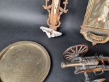 a picture of a crucifix, a picture of jesus, and other items on a table