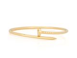 a gold bracelet with a bar in the middle of it