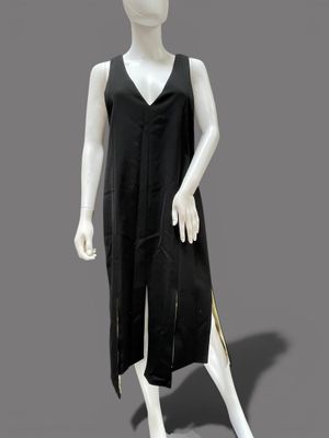 mannequin dressed in a black dress with gold trims