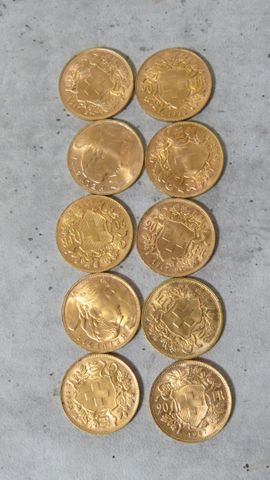 Dix pièces de monnaies en or à valeur faciale de 20 francs Suisse...