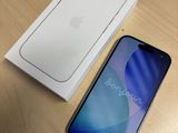 an apple iphone is sitting next to a box on a table