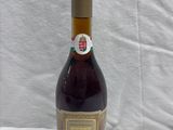 a bottle of wine that is sitting on a table