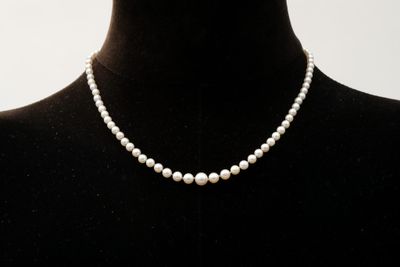 Collier de perles en chutes en or jaune 750 millièmes, le fe…