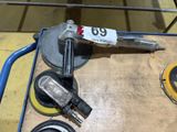 some tools are sitting on a table in a room