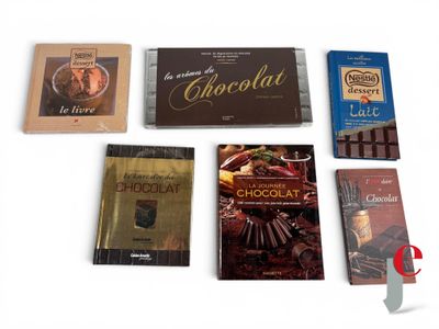 many chocolates that are sitting on a table