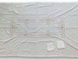an image of a white cloth with a square design on it