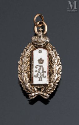 a close up of a medal on a black surface