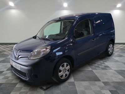 a picture of a blue van on a checkered floor