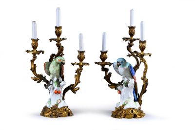 two candles that are sitting next to each other