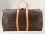 Sac Keepall Louis Vuitton en toile Monogram et cuir