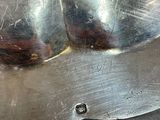 a close up of a metal object on a table