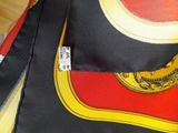 a close up of a tie with a picture on it