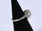 a close up of a ring on a black ring holder
