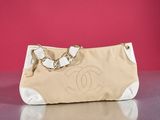 chanel beige and white canvas handbag with chain strap