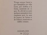 an open book with a black and white image of a cat