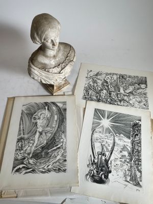 quatre livres illustrés posés sur une table