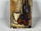 une nature morte représentant une bouteille de vin et des prunes