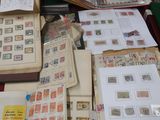 a table with many different types of stamps on it