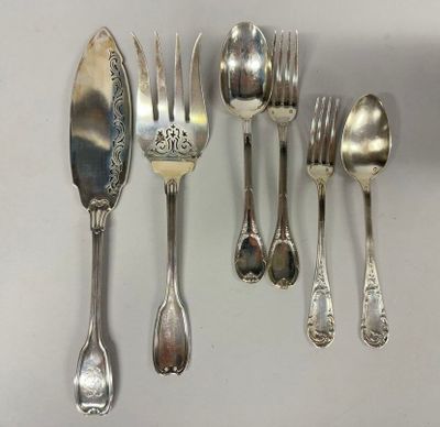 a lot of silver spoons and forks on the table