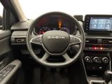 the interior of a car with a steering wheel, dashboard, and dash board