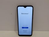 l'arrière d'un Samsung S9 noir avec un bouton bleu sur l'écran