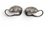 pair of silver plated earrings with floral design