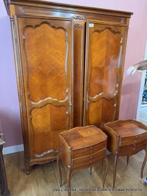 two tables and a cabinet in a room
