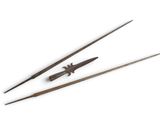 two wooden chopsticks and a knife on a white surface