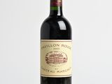 a bottle of wine that is sitting on a table
