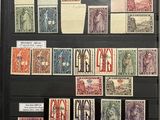 a picture of a collection of stamps on display in a glass case