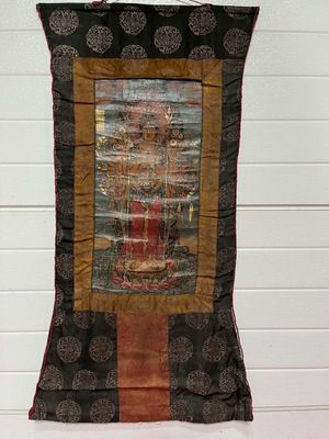 a picture of a tapestry hanging on a wall
