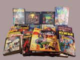 a lot of comic books sitting on a table