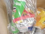 a cardboard box filled with assorted food items