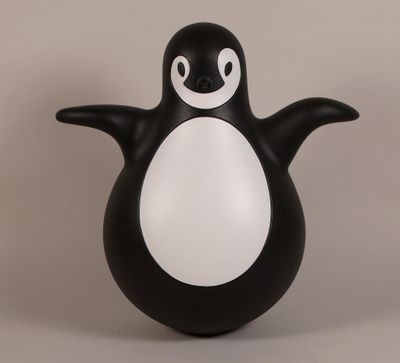 an image of a black and white penguin lamp