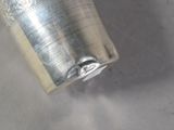 a silver cup that is sitting on a table