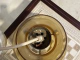 a glass of water sitting on a table next to a glass of wine