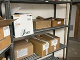 many boxes and boxes on the shelves in the room